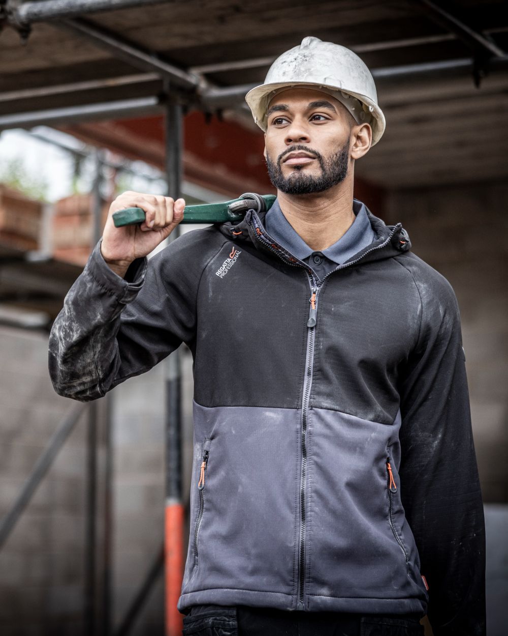 Iron Black coloured Regatta Mens Surrender Softshell Jacket on blurry background 
