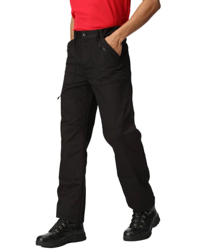 Black coloured Regatta Pro Action Trousers on white background 