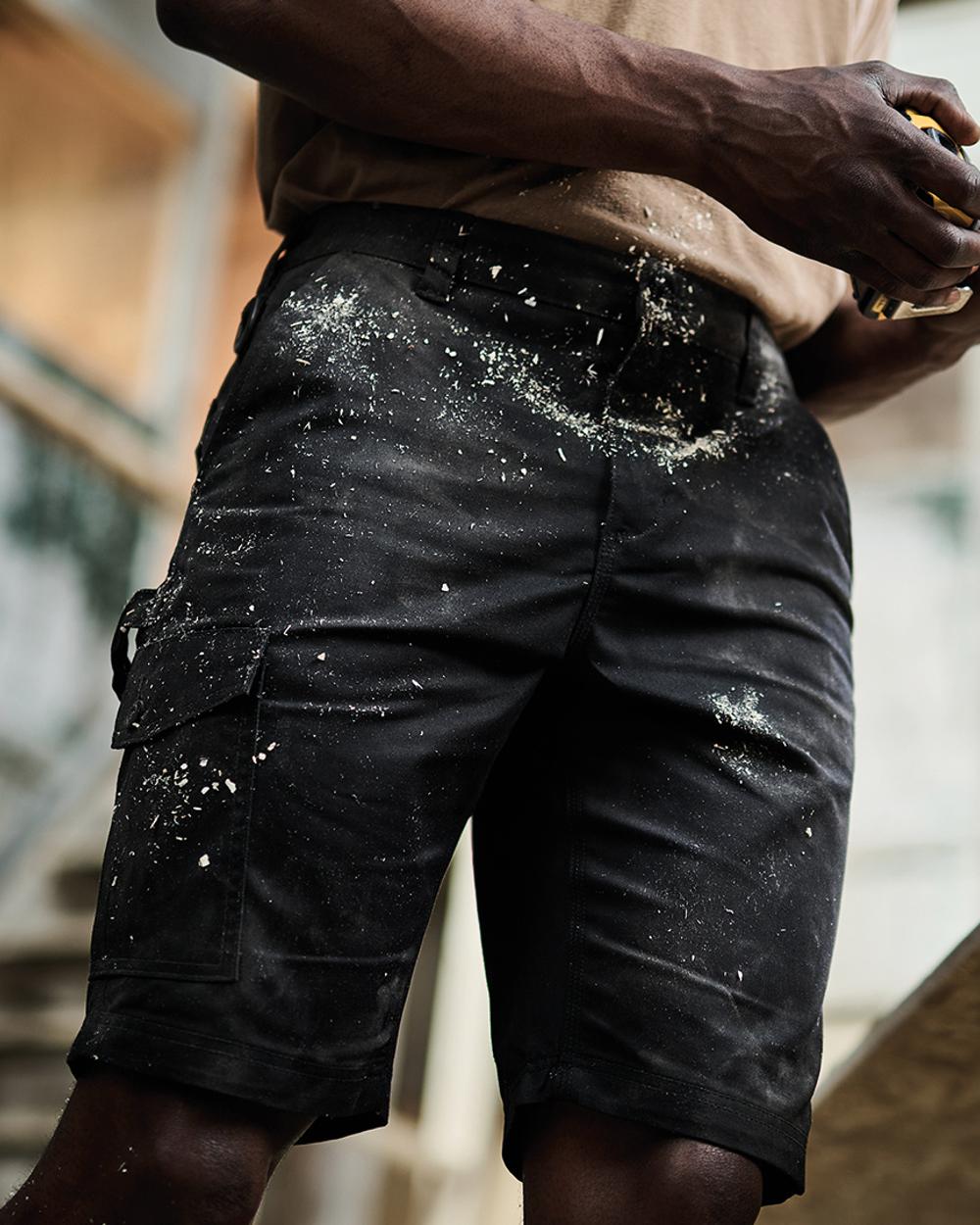 Black coloured Regatta Pro Cargo Shorts on blurry background 