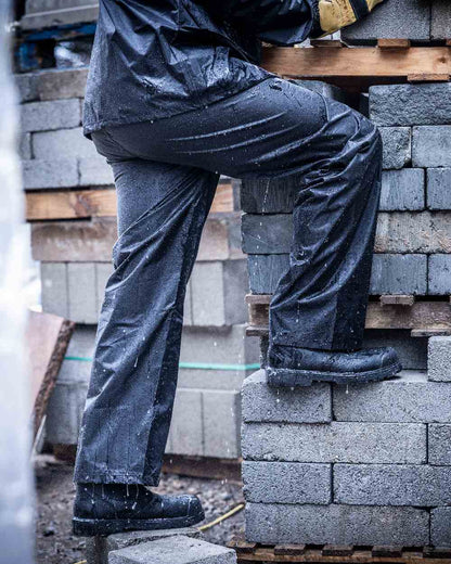 Black Coloured Regatta Pro Stormbreak Waterproof Overtrousers on outdoor background 