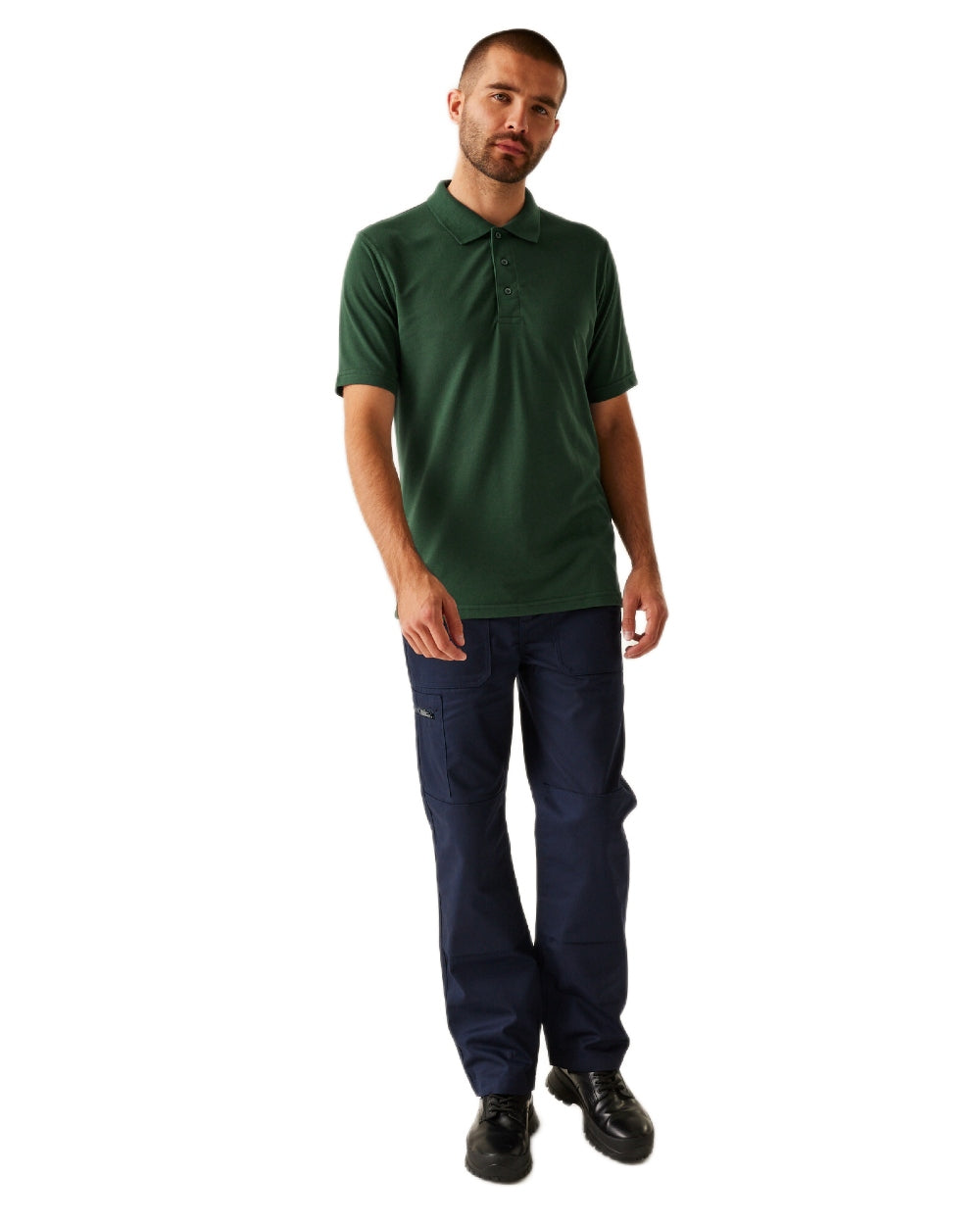 Dark Green coloured Regatta Professional Mens 65/35 Short Sleeves Polo Top on white background 