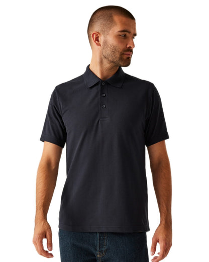 Navy coloured Regatta Professional Mens 65/35 Short Sleeves Polo Top on white background 