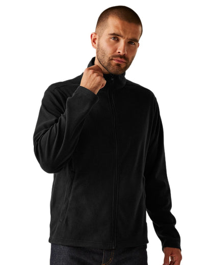 Black coloured Regatta Professional Mens Classic Full Zip Lightweight Microfleece Jacket on white background 