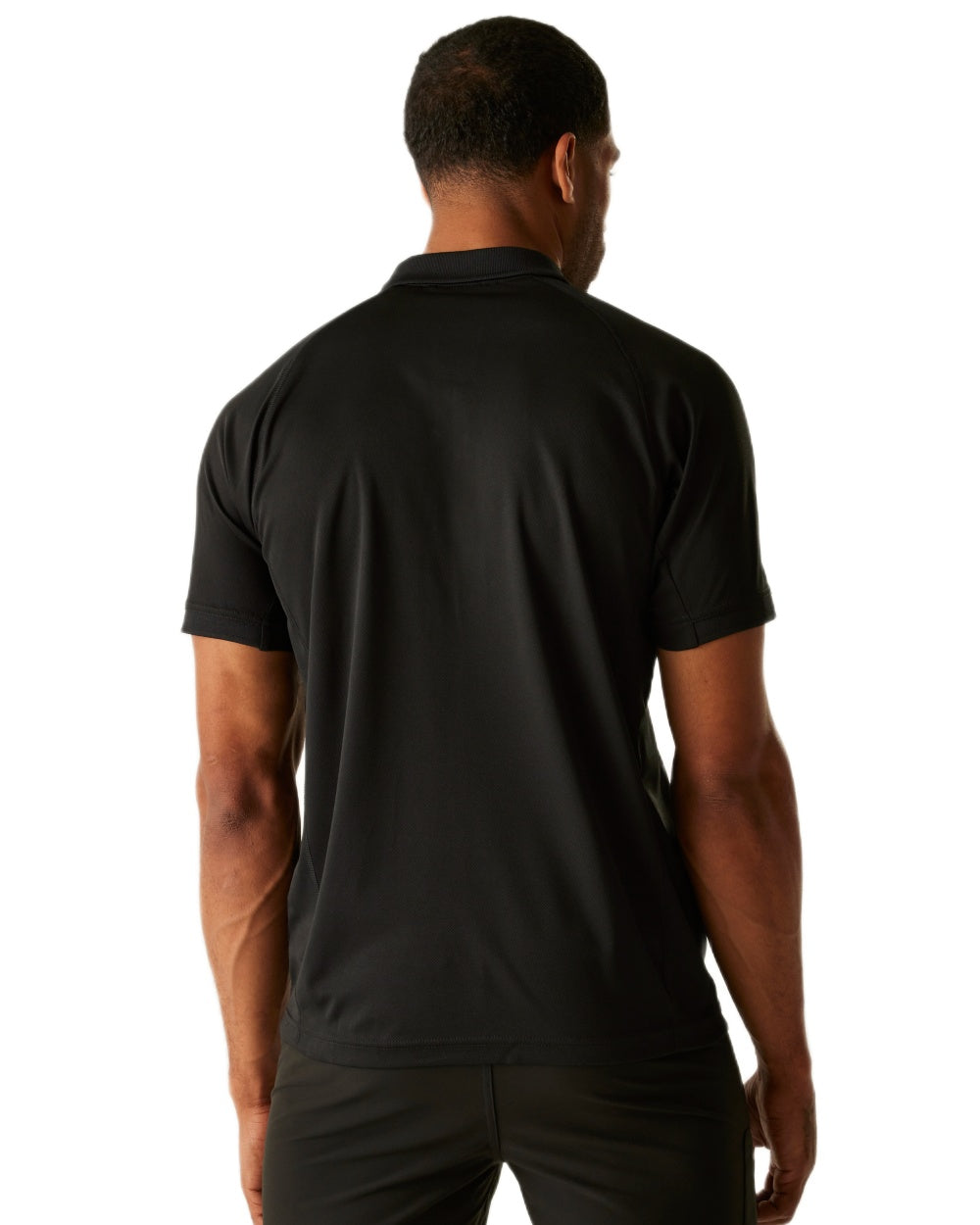 Black coloured Regatta Professional Mens Coolweave Wicking Polo Shirt on white background 