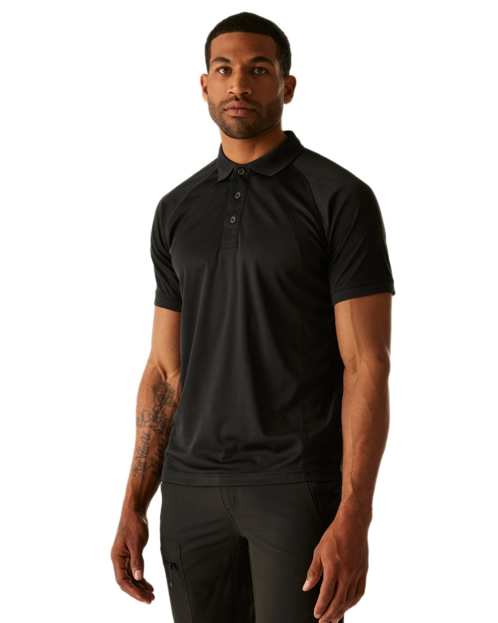 Black coloured Regatta Professional Mens Coolweave Wicking Polo Shirt on white background 