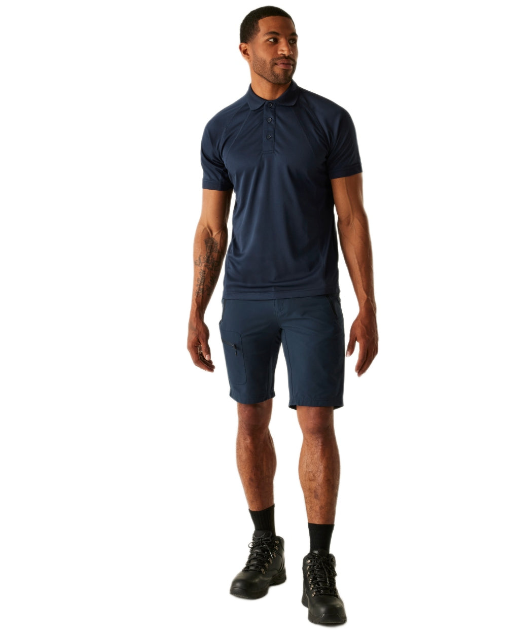 Navy coloured Regatta Professional Mens Coolweave Wicking Polo Shirt on white background 