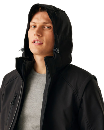 Black coloured Regatta Professional Mens Erasmus 4 In 1 Softshell Jacket on white background 