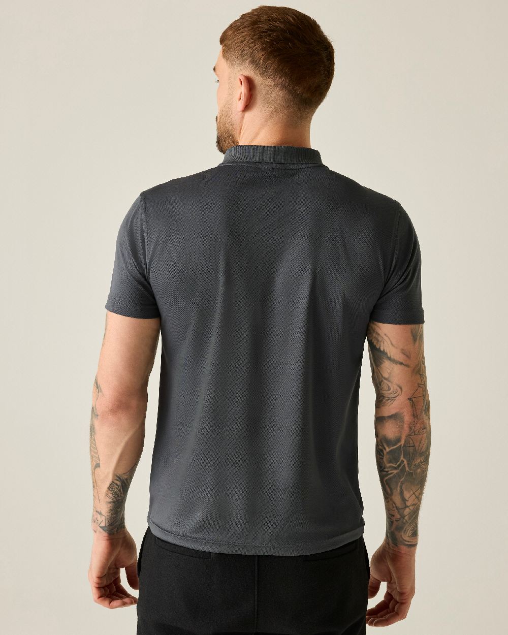Solid Grey colour Regatta Professional Mens Pro Wicking Pique Polo Shirt on beige background 