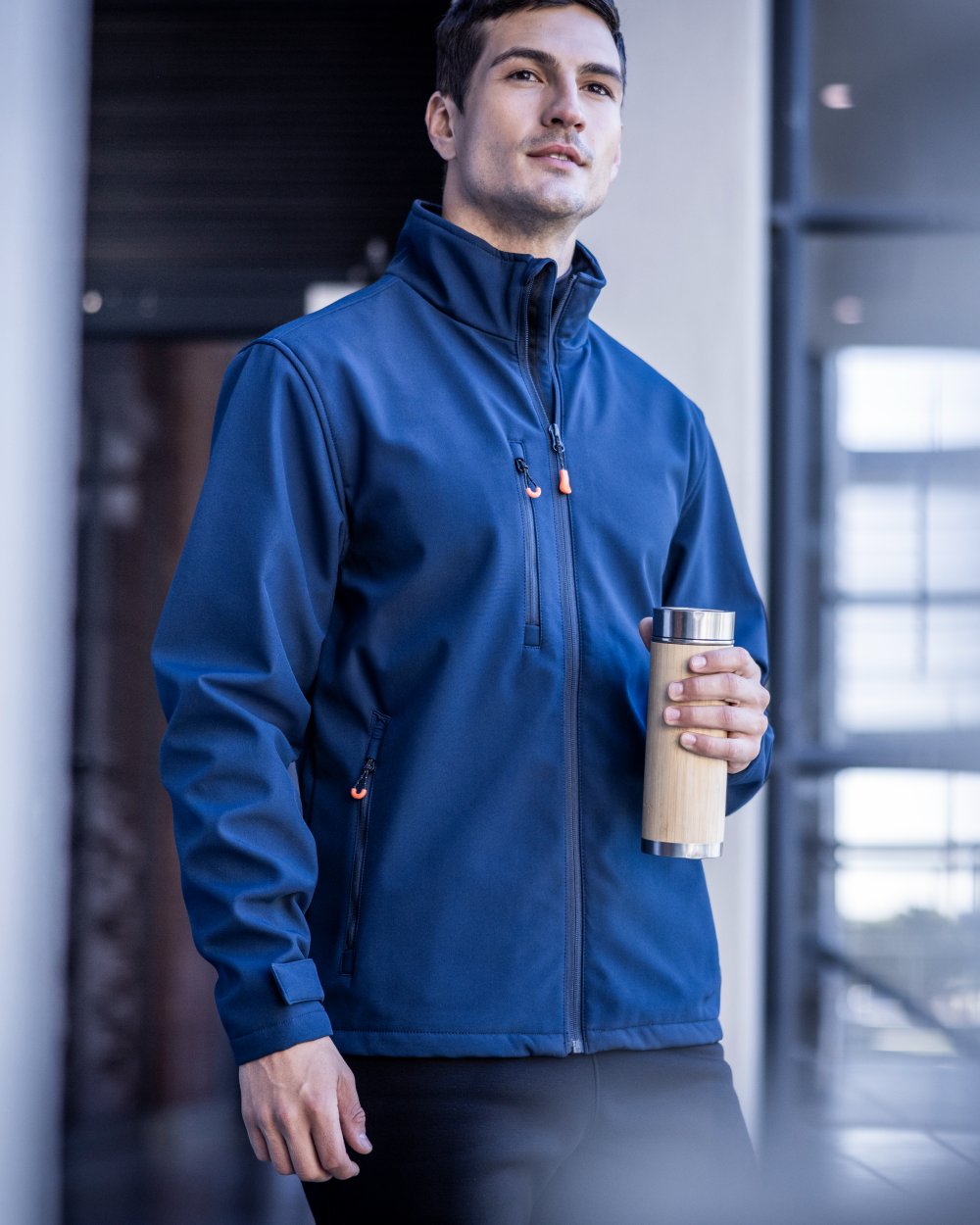 Navy coloured Regatta Professional Mens Thermogen Heated Softshell Jacket on outdoor background 
