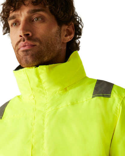Yellow Navy coloured Regatta Professional Mens Waterproof Hi-Vis Bomber Jacket on white background 