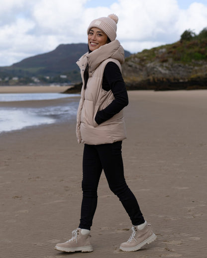 Soft Taupe Coloured Regatta Womens Kelse Gilet on beach background 