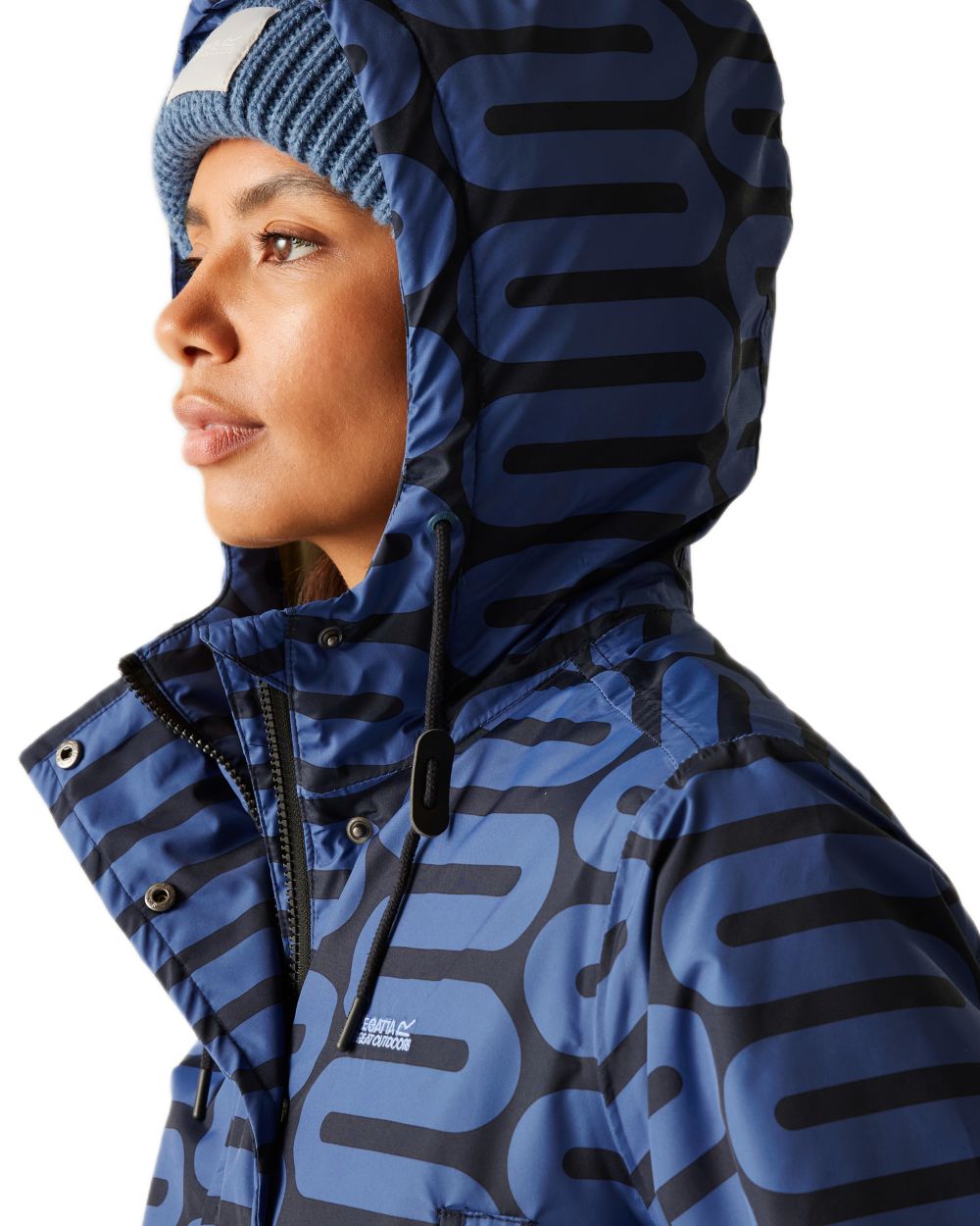 Large Wiggle Blue Coloured Regatta Womens Orla Kiely Mid Length Waterproof Jacket on white background 