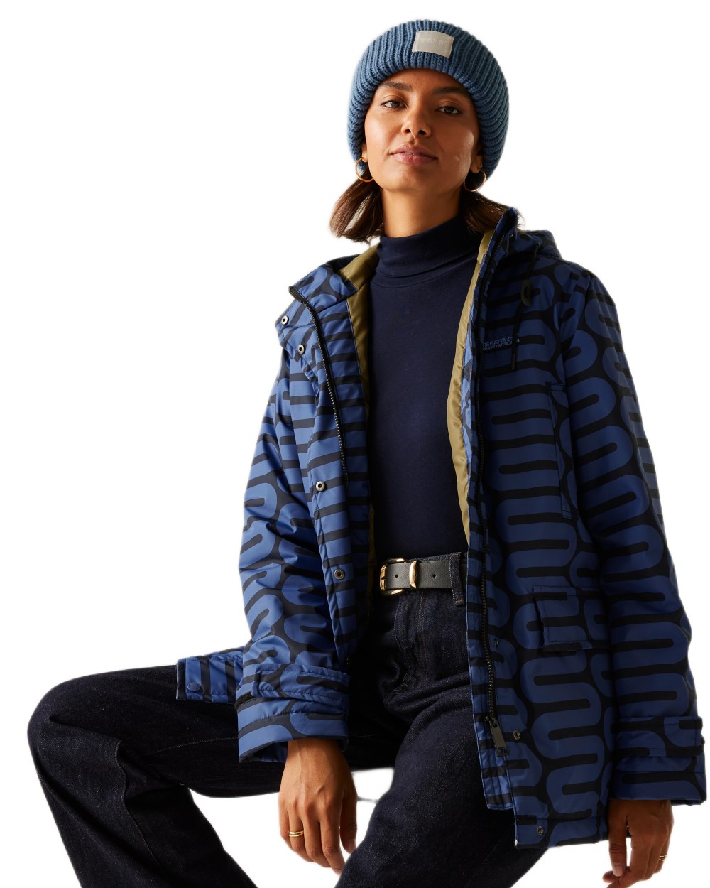 Large Wiggle Blue Coloured Regatta Womens Orla Kiely Mid Length Waterproof Jacket on white background 