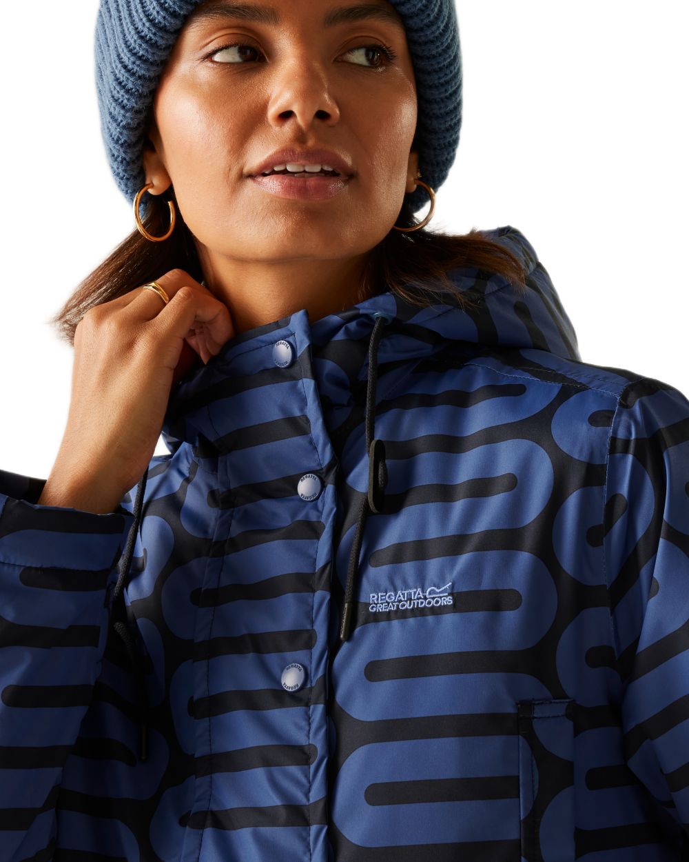 Large Wiggle Blue Coloured Regatta Womens Orla Kiely Mid Length Waterproof Jacket on white background 