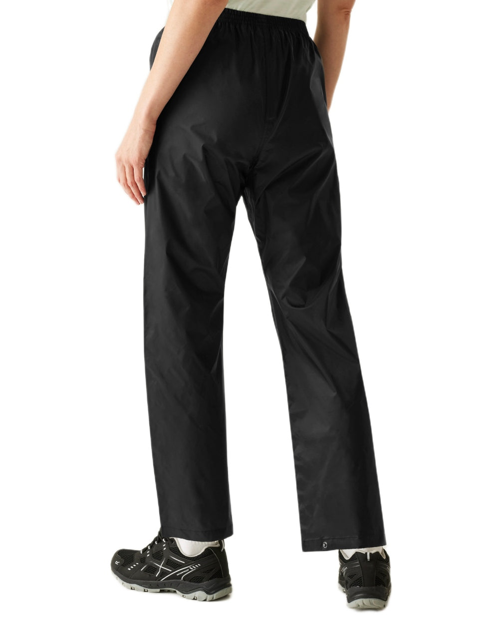 Black Coloured Regatta Womens Pack It Waterproof Overtrousers on white background 