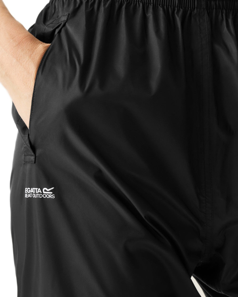 Black Coloured Regatta Womens Pack It Waterproof Overtrousers on white background 