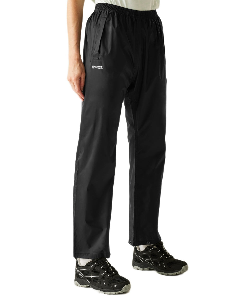 Black Coloured Regatta Womens Pack It Waterproof Overtrousers on white background 