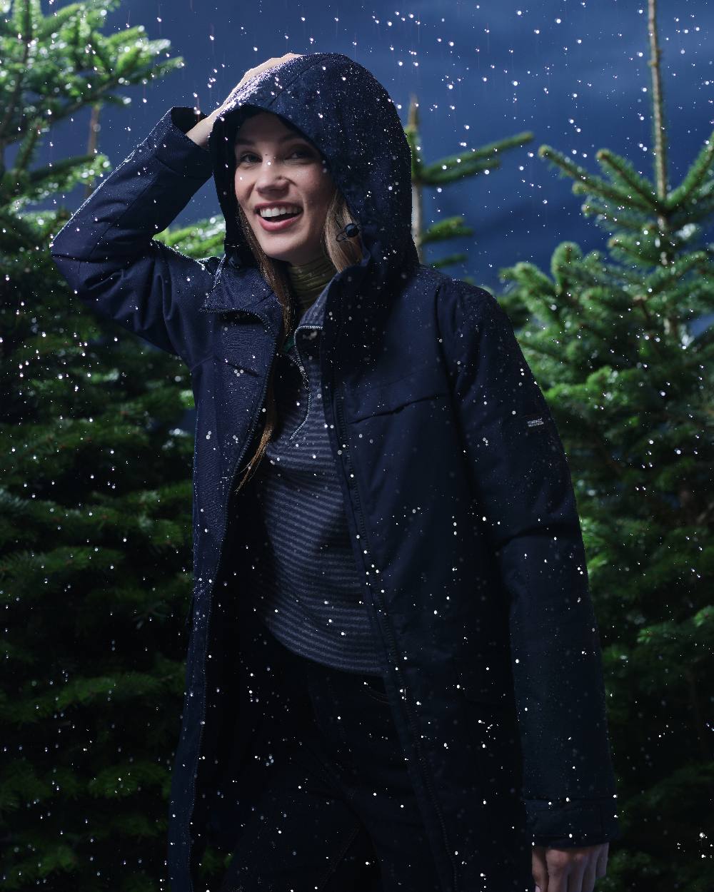 Navy Coloured Regatta Womens Romine II Waterproof Parka Jacket on tree background 