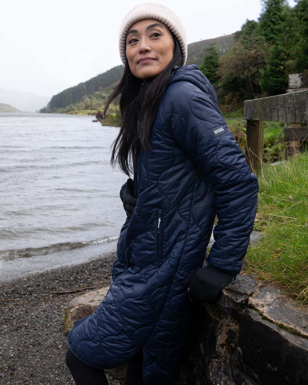 Navy Coloured Regatta Womens Triea Quilted Jacket on lake background 