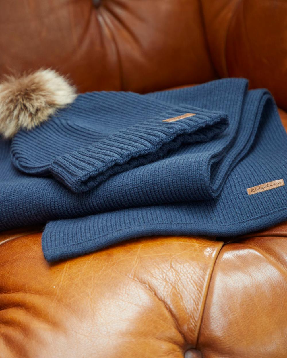 Tarn coloured Ridgeline Baltic Bobble Hat &amp; Scarf Set on indoor background 