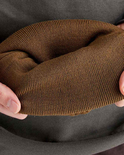Teak coloured Ridgeline Heritage Fine Knit Beanie on white background 