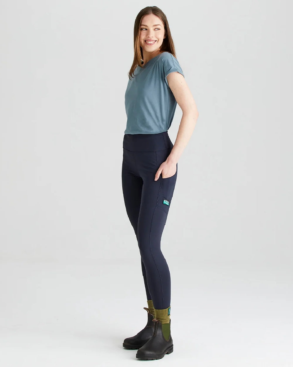 Navy coloured Ridgeline Infinity Pro Leggings on grey background 