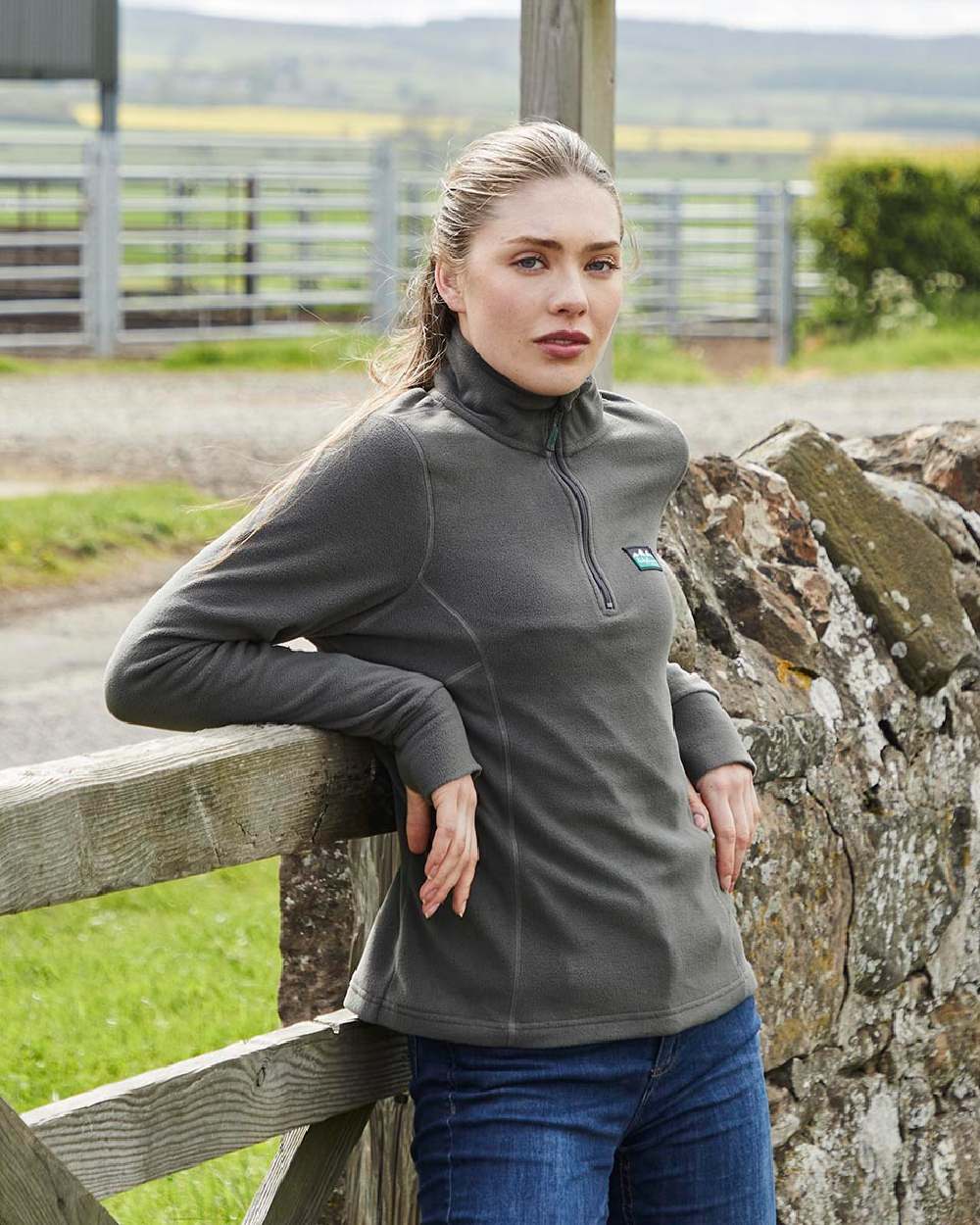 Moss coloured Ridgeline Ladies Narvik Fleece on farm background 