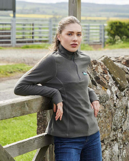 Moss coloured Ridgeline Ladies Narvik Fleece on farm background 