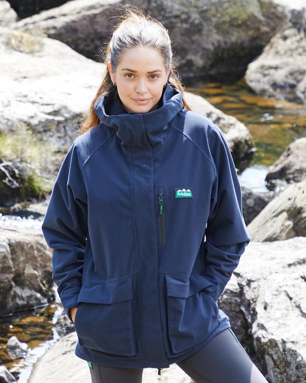 Navy Coloured Ridgeline Ladies Rhea Jacket on outdoor background 