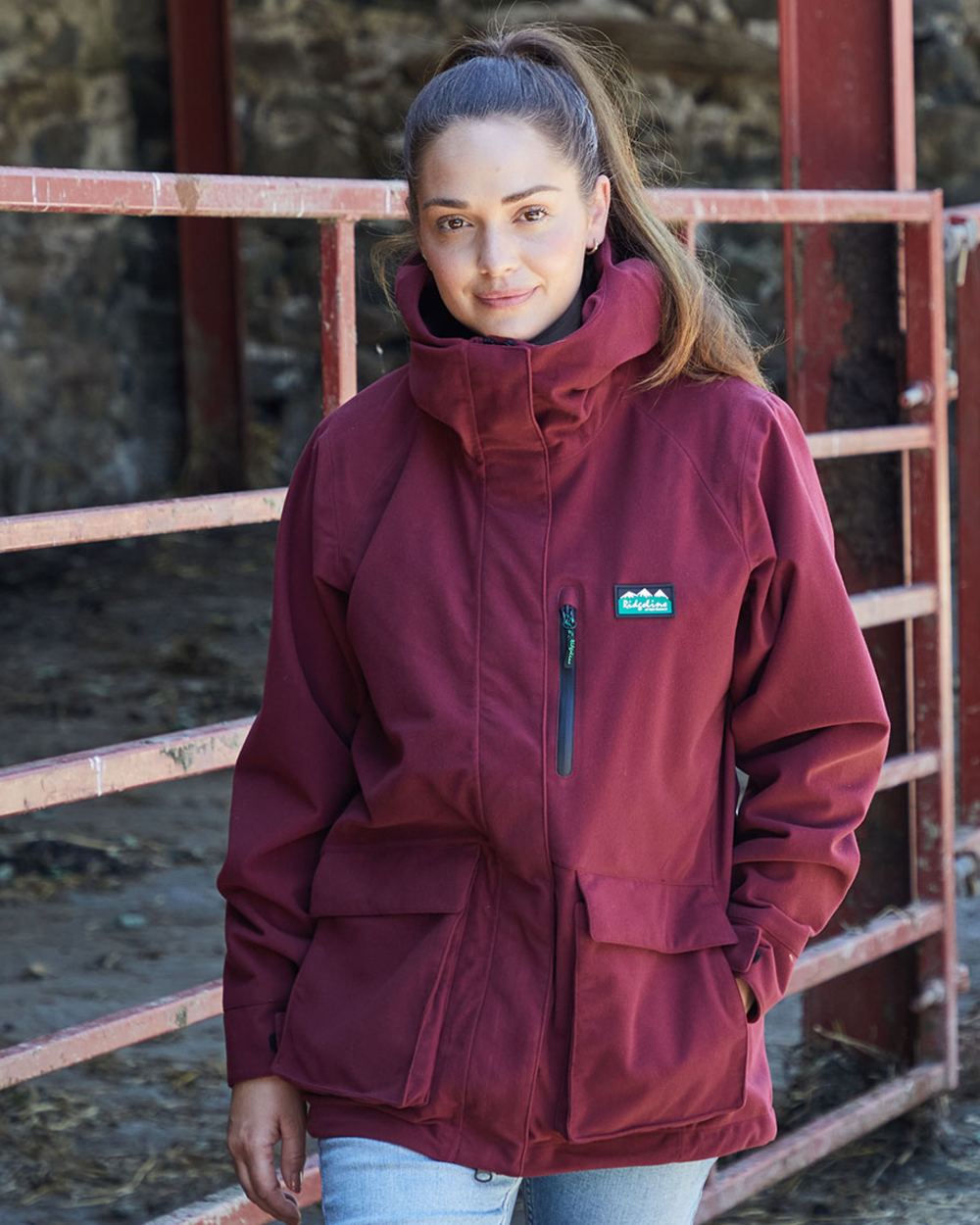 Winter Berry Coloured Ridgeline Ladies Rhea Jacket on outdoor background 