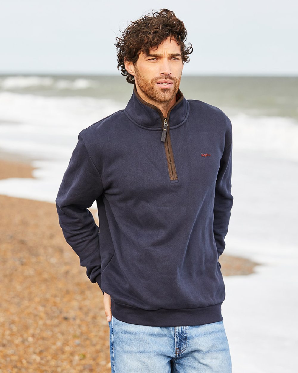 Navy Coloured Ridgeline Mens Brancaster Quarter Zip Top on outdoor background 