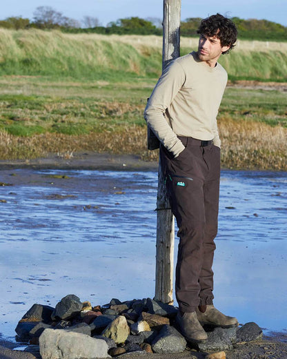 Deep Bark coloured Ridgeline Mens Grafter Trousers on river background 