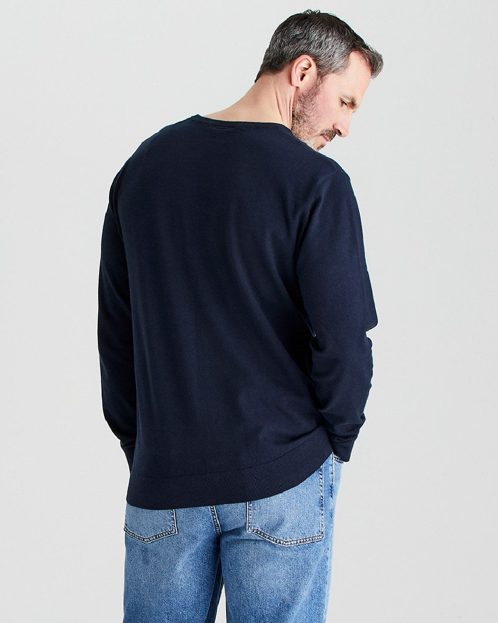 Navy coloured Ridgeline Mens Hartland Crew Knit Jumper on grey background 