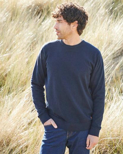 Navy coloured Ridgeline Mens Hartland Crew Knit Jumper on field background 