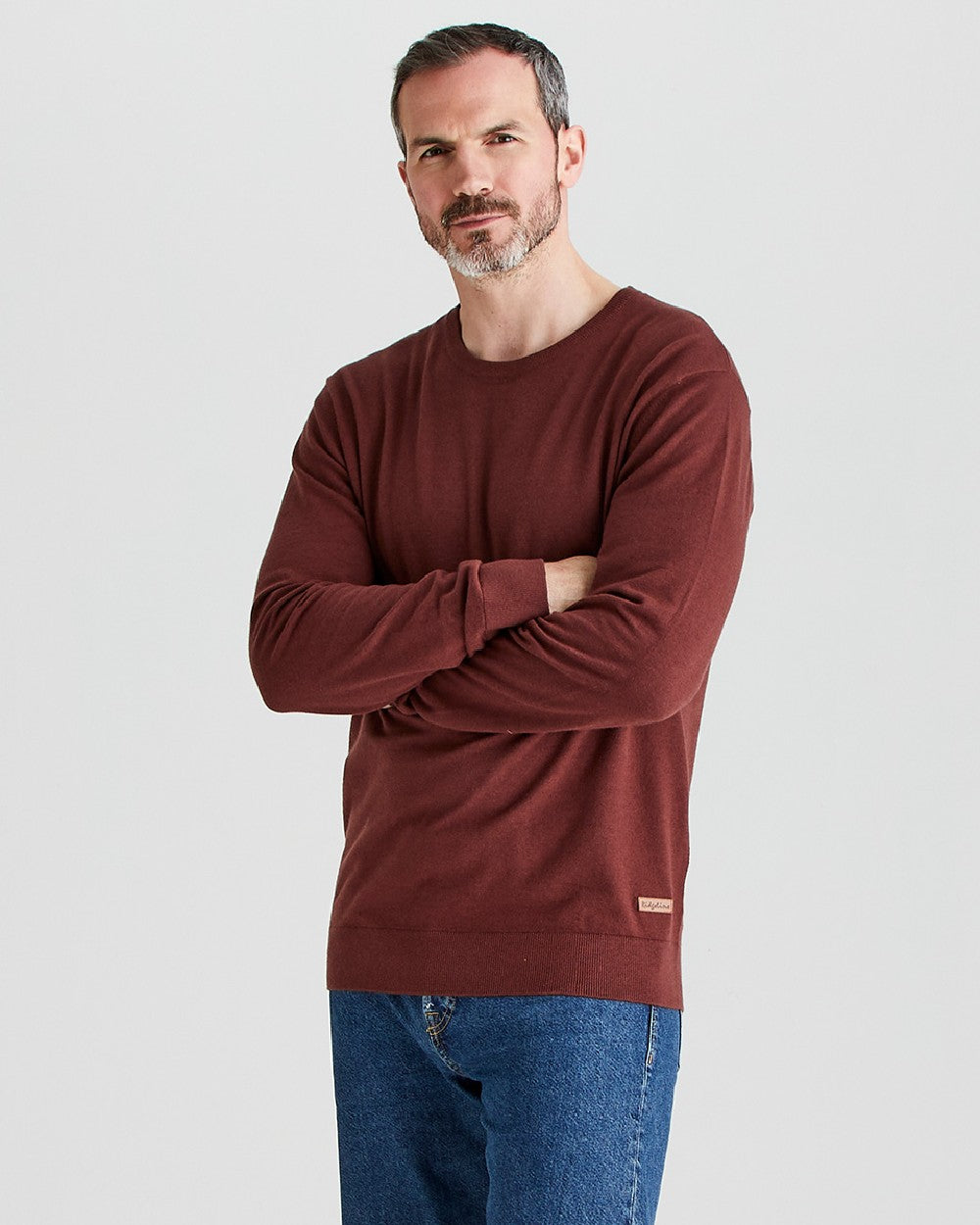 Oxblood coloured Ridgeline Mens Hartland Crew Knit Jumper on grey background 