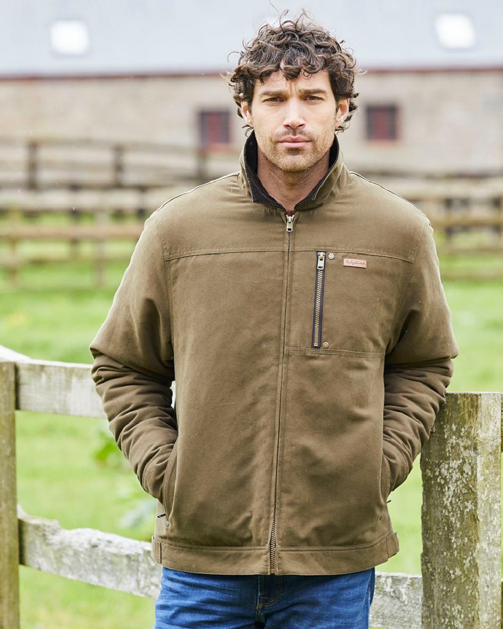 Moody Teak coloured Ridgeline Mens Montana Work Coat on farm background 