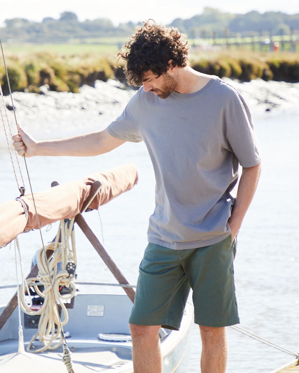 Khaki Green Coloured Ridgeline Mens Waxham Shorts on outdoor background 