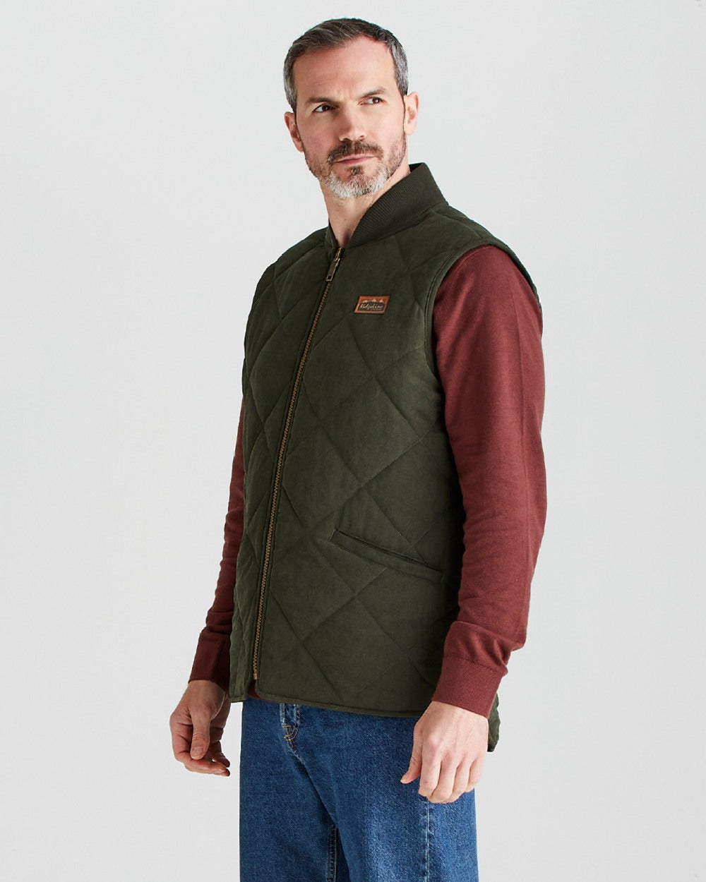 Deep Forest coloured Ridgeline Mens Wester Skeld Gilet on grey background 