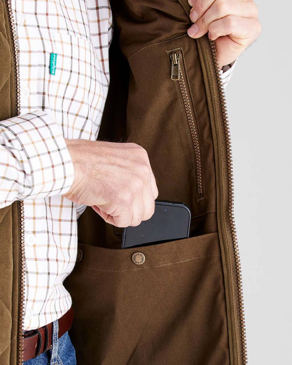Moody Teak coloured Ridgeline Mens Wester Skeld Gilet on grey background 