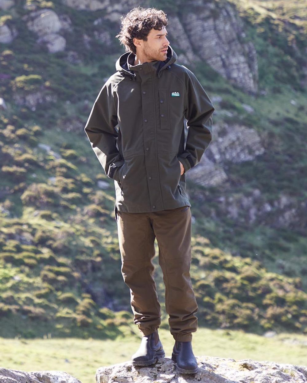 Deep Forest Coloured Ridgeline Monsoon Classic Jacket On A Mountain Background 