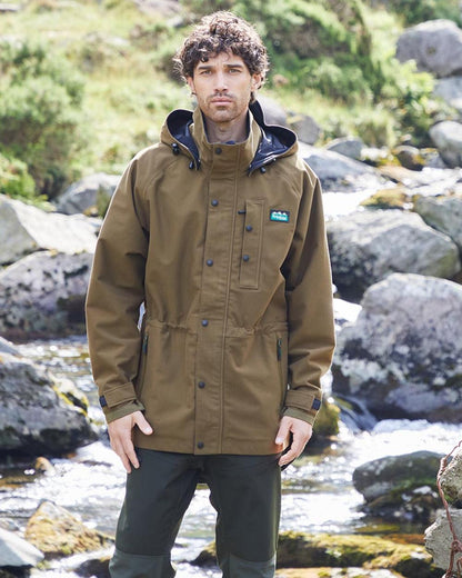 Teak coloured Monsoon Classic Waterproof Jacket on lake background 
