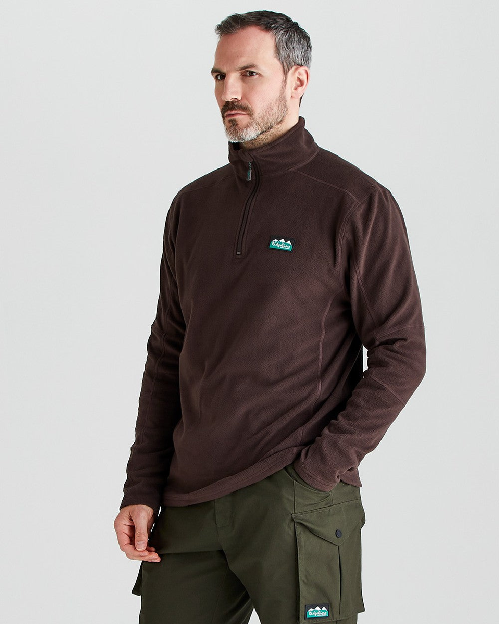 Deep Bark coloured Ridgeline Narvik Fleece on grey background 