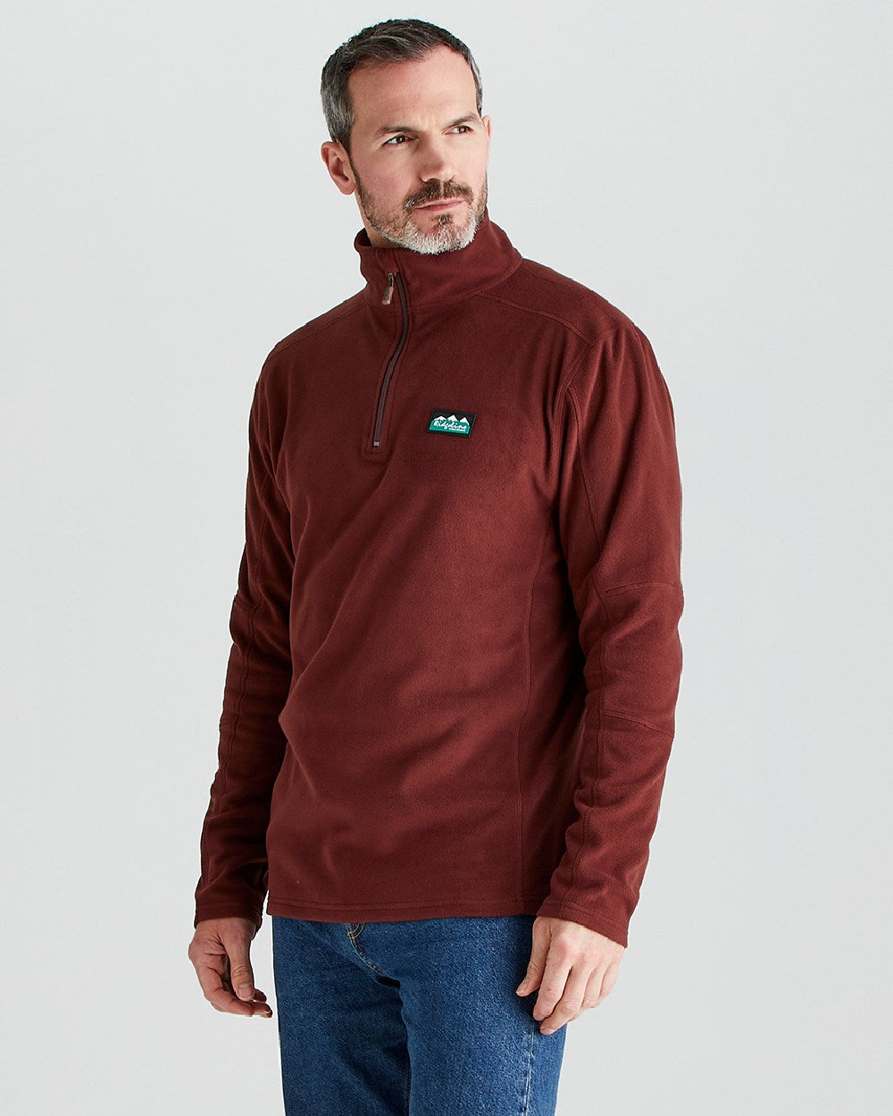 Oxblood coloured Ridgeline Narvik Fleece on grey background 