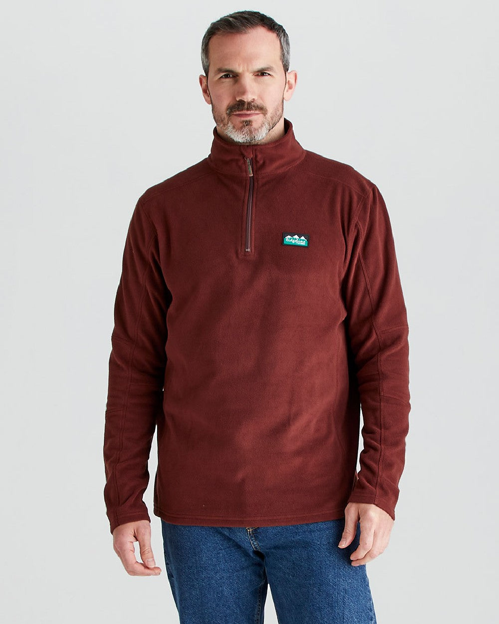 Oxblood coloured Ridgeline Narvik Fleece on grey background 