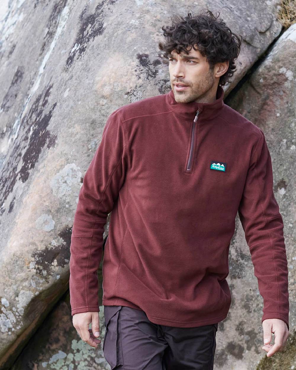 Oxblood coloured Ridgeline Narvik Fleece on yard background 