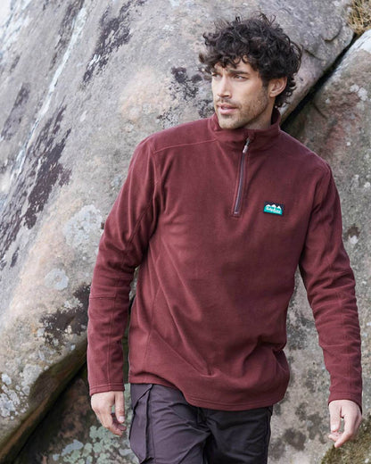 Oxblood coloured Ridgeline Narvik Fleece on yard background 