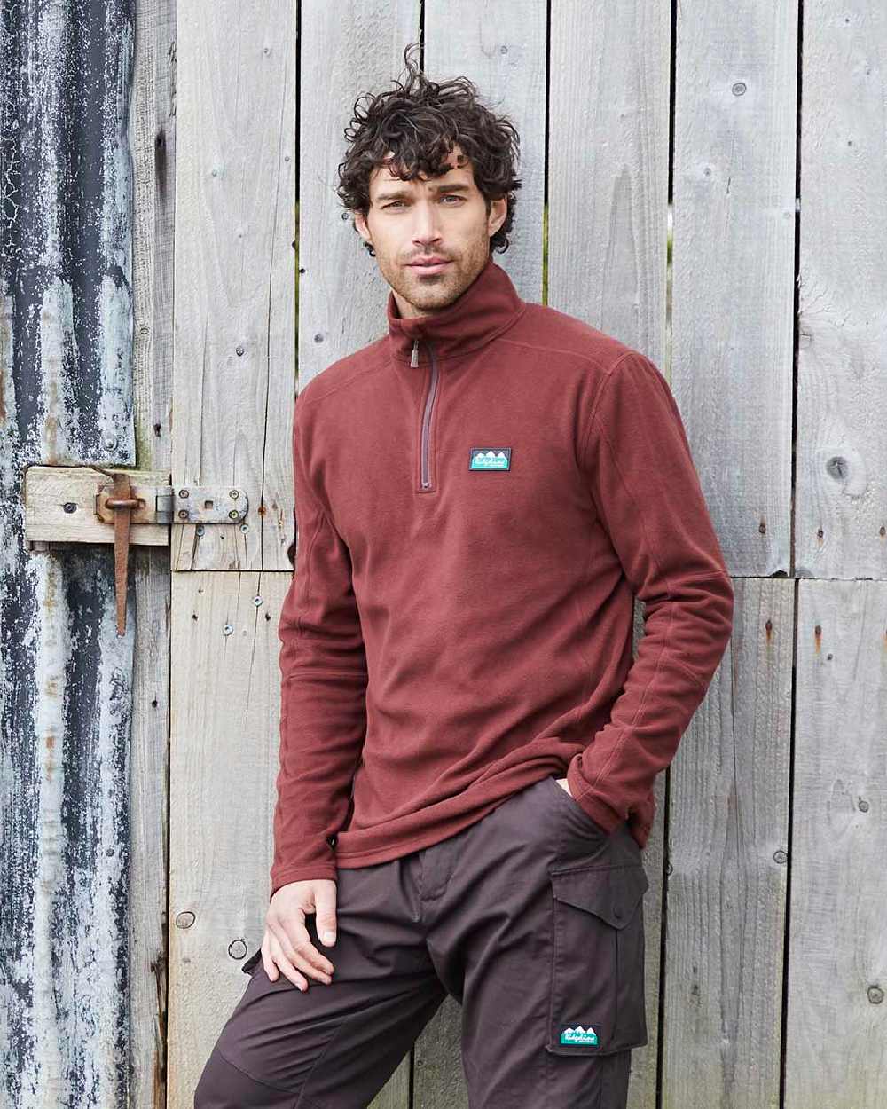 Oxblood coloured Ridgeline Narvik Fleece on yard background 