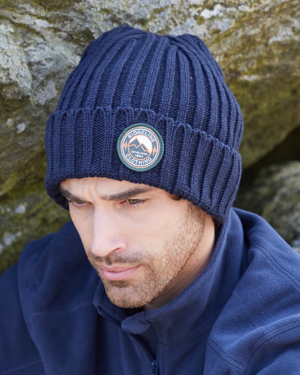 Navy Coloured Ridgeline Original Knitted Beanie on outdoor background 