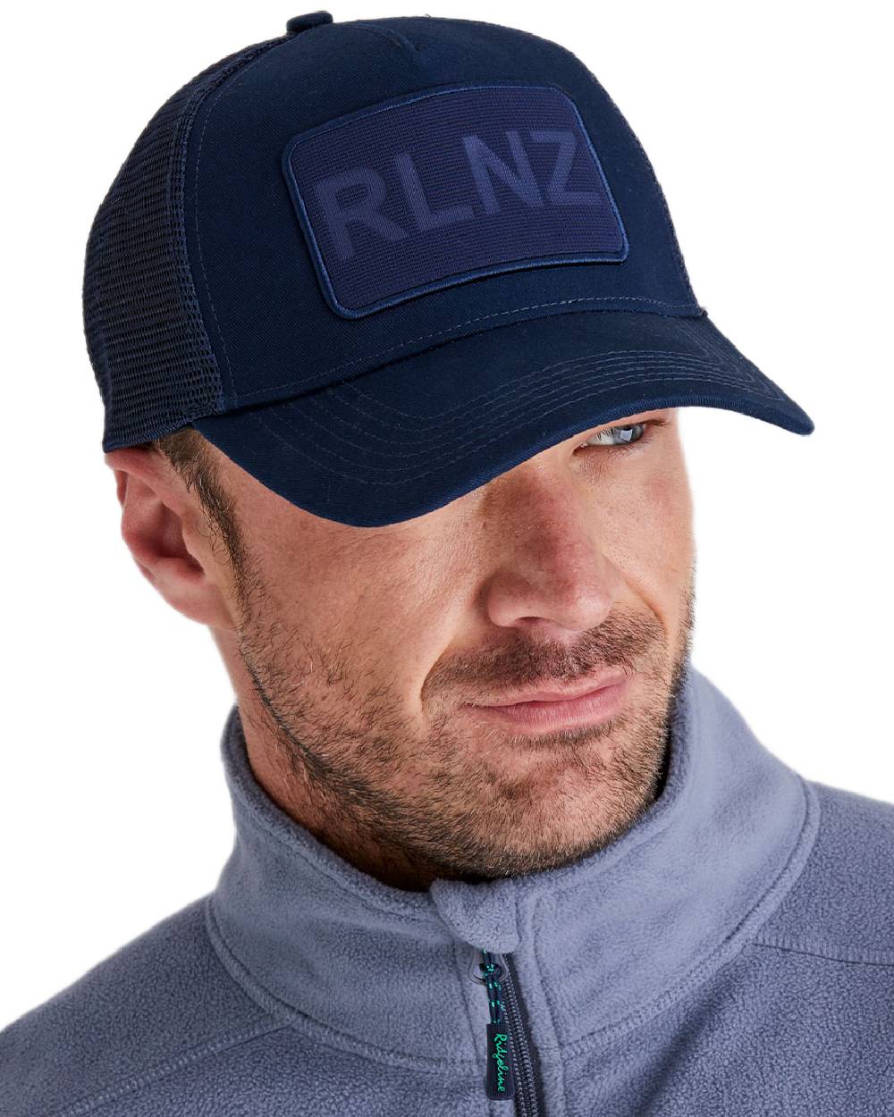 Navy Coloured Ridgeline RLNZ Trucker Cap on white background 