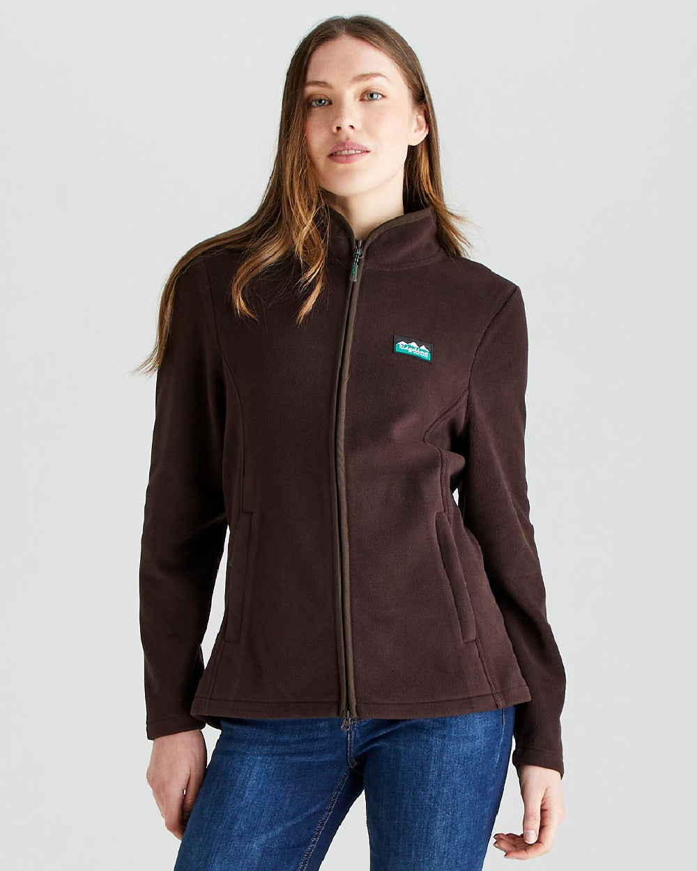 Deep Bark coloured Ridgeline Womens Brenna Fleece Jacket on grey 